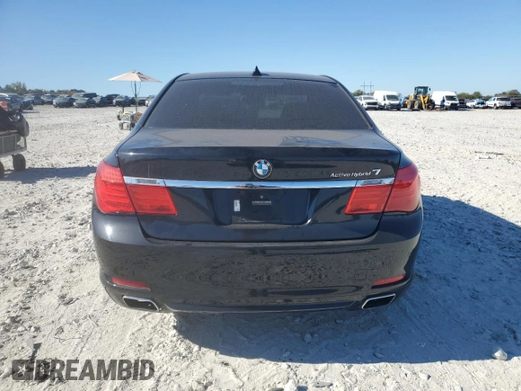 2011 BMW 7 Series with VIN WBAKX8C55BC198177, listed as a Copart auction lot 77016924 with 99,275 mi miles and Salvage title. Bid and sale history available at DreamBid. Image 6.