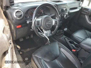 2016 Jeep Wrangler Rubicon z VIN 1C4BJWCG3GL275971, wystawiony jako Copart lot #60329125 z przebiegiem 25 956 mil mil oraz Szkoda całkowita • Salvage title. Historia ofert i sprzedaży dostępna na DreamBid. Obrazek 8.