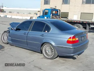 2003 BMW 3 Series 330i with VIN WBAEV53453KM03321, listed as a IAAI auction lot 41134433 with 186,586 mi miles. Bid and sale history available at carsss.com. Image 3.