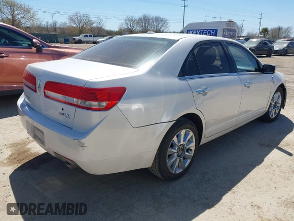 2012 Lincoln MKZ with VIN 3LNHL2GC2CR813653, listed as a IAAI auction lot 41751793 with 216,961 mi miles and . Bid and sale history available at DreamBid. Image 4.