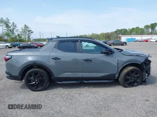 2023 Hyundai Santa Cruz Night Edition z VIN 5NTJCDAF0PH054192, wystawiony jako IAAI lot #40734723 z przebiegiem 9 700 mil mil oraz . Historia ofert i sprzedaży dostępna na DreamBid. Obrazek 14.