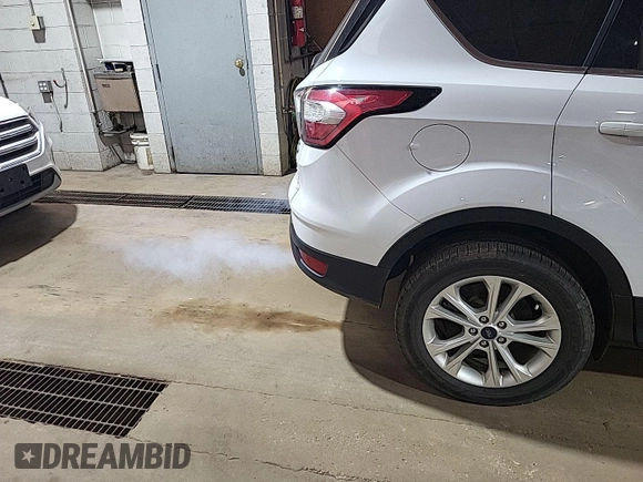2018 Ford Escape SE z VIN 1FMCU9GD4JUA76194, wystawiony jako IAAI lot #42421138 z przebiegiem 47 896 mil mil oraz . Historia ofert i sprzedaży dostępna na DreamBid. Obrazek 15.