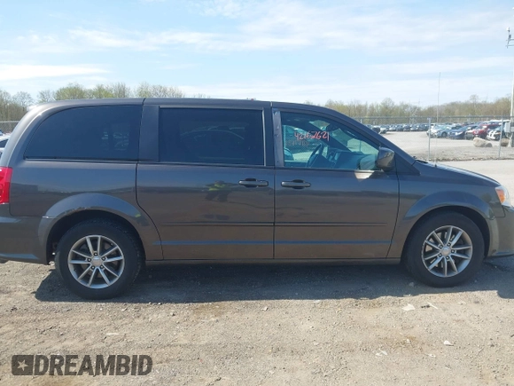 2015 Dodge Grand Caravan SE with VIN 2C4RDGBG2FR684367, listed as a IAAI auction lot 42167621 with 216,628 mi miles and . Bid and sale history available at DreamBid. Image 13.