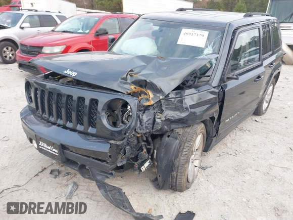 2014 Jeep Patriot Latitude with VIN 1C4NJRFB3ED551622, listed as a IAAI auction lot 40917179 with 109,856 mi miles. Bid and sale history available at carsss.com. Image 6.