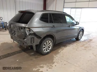 2018 Volkswagen Tiguan S with VIN 3VV1B7AX7JM106531, listed as a IAAI auction lot 41668403 with 119,885 mi miles. Bid and sale history available at carsss.com. Image 4.