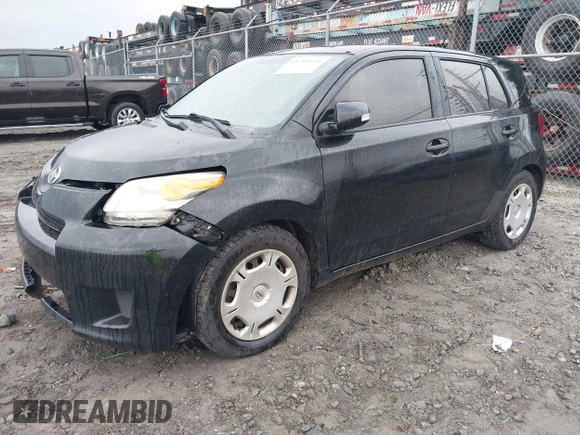 2010 Scion xD with VIN JTKKU4B45AJ058839, listed as a IAAI auction lot 41708936 with 214,685 mi miles. Bid and sale history available at carsss.com. Image 17.