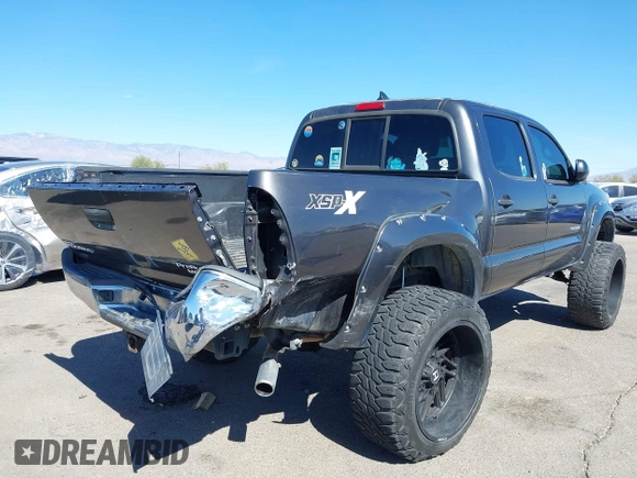 2014 Toyota Tacoma PreRunner with VIN 3TMJU4GN3EM165840, listed as a IAAI auction lot 41666871 with 150,333 mi miles and . Bid and sale history available at DreamBid. Image 4.