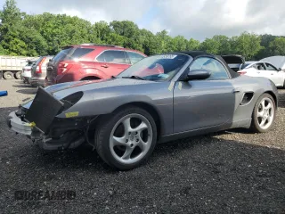2001 Porsche Boxster with VIN WP0CA29841U620553, listed as a Copart auction lot 63839765 with 116,067 mi miles and Salvage title. Bid and sale history available at DreamBid. Image 1.