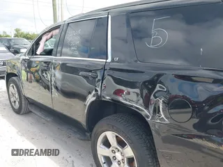 2018 Chevrolet Tahoe LT with VIN 1GNSCBKCXJR132867, listed as a IAAI auction lot 41456319 with 59,131 mi miles and . Bid and sale history available at DreamBid. Image 18.