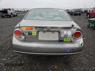 2002 Nissan Maxima GXE с VIN JN1DA31D12T414295, выставлен на аукционе Copart как лот 83090944 с пробегом 175 456 миль миль и Списание • Salvage title. История ставок и продаж доступна на DreamBid. Изображение 6.