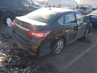 2015 Nissan Sentra SR with VIN 3N1AB7AP4FY301598, listed as a IAAI auction lot 41450677 with 128,708 mi miles and . Bid and sale history available at DreamBid. Image 4.