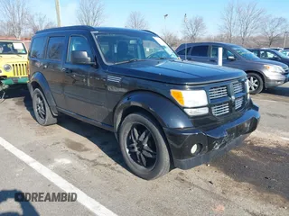 2007 Dodge Nitro R/T with VIN 1D8GU58687W702584, listed as a IAAI auction lot 41638743 with 123,018 mi miles. Bid and sale history available at carsss.com. Image 1.