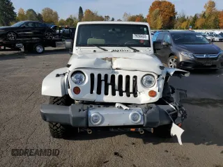 2010 Jeep Wrangler Sahara с VIN 1J4AA5D10AL181225, выставлен на аукционе Copart как лот 79696464 с пробегом 90 139 миль миль и Списание • Salvage title. История ставок и продаж доступна на DreamBid. Изображение 5.