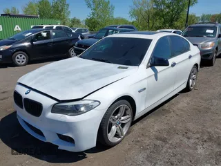 2013 BMW 5 Series 535i with VIN WBAFR7C54DC819983, listed as a IAAI auction lot 42141306 with 135,938 mi miles and . Bid and sale history available at carsss.com. Image 2.