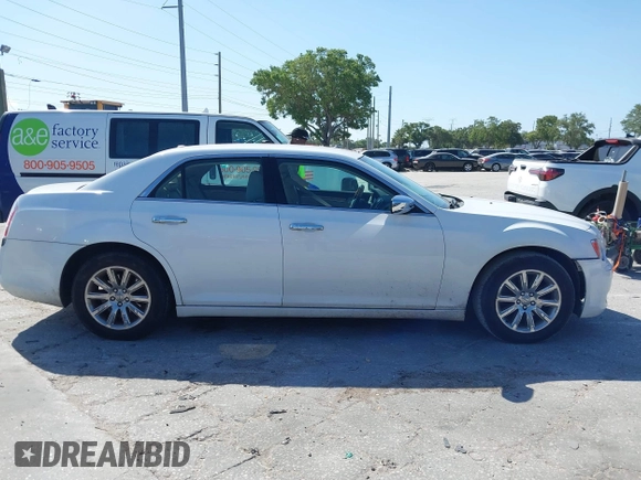 2014 Chrysler 300 with VIN 2C3CCAET6EH173381, listed as a IAAI auction lot 42158270 with 124,551 mi miles. Bid and sale history available at carsss.com. Image 13.