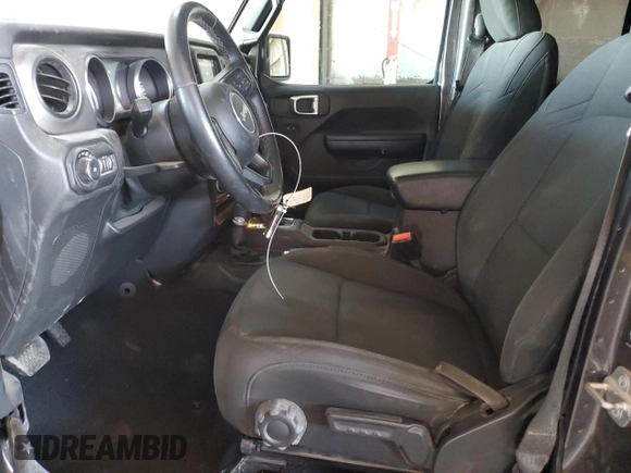 2021 Jeep Wrangler Unlimited Freedom with VIN 1C4HJXDG0MW648666, listed as a Copart auction lot 84260174 with 39,021 mi miles and Salvage title. Bid and sale history available at DreamBid. Image 7.