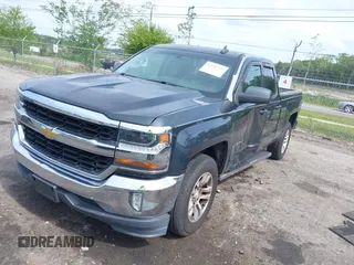 2017 Chevrolet Silverado 1500 LT with VIN 1GCRCREC4HZ298856, listed as a IAAI auction lot 42102225 with 147,501 mi miles and . Bid and sale history available at DreamBid. Image 17.