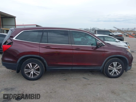 2016 Honda Pilot EX-L with VIN 5FNYF5H58GB026209, listed as a IAAI auction lot 41333088 with 129,484 mi miles and . Bid and sale history available at DreamBid. Image 13.