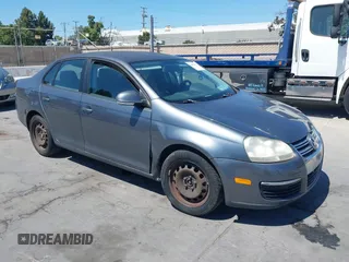 2009 Volkswagen Jetta S with VIN 3VWJM71K79M056347, listed as a IAAI auction lot 42662411 with 171,395 mi miles and . Bid and sale history available at DreamBid. Image 1.