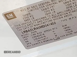 2021 Buick Envision Preferred with VIN LRBAZLR45MD041450, listed as a IAAI auction lot 41820633 with 36,722 mi miles and . Bid and sale history available at DreamBid. Image 9.