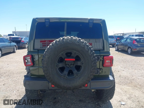2020 Jeep Wrangler Unlimited Sahara High Altitude with VIN 1C4HJXEG8LW283103, listed as a IAAI auction lot 41830769 with 39,447 mi miles and . Bid and sale history available at DreamBid. Image 16.