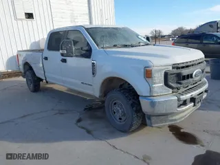 2022 Ford Super Duty F-250 SRW XL with VIN 1FT7W2BTXNED39925, listed as a IAAI auction lot 41346136 with 166,092 mi miles. Bid and sale history available at carsss.com. Image 1.