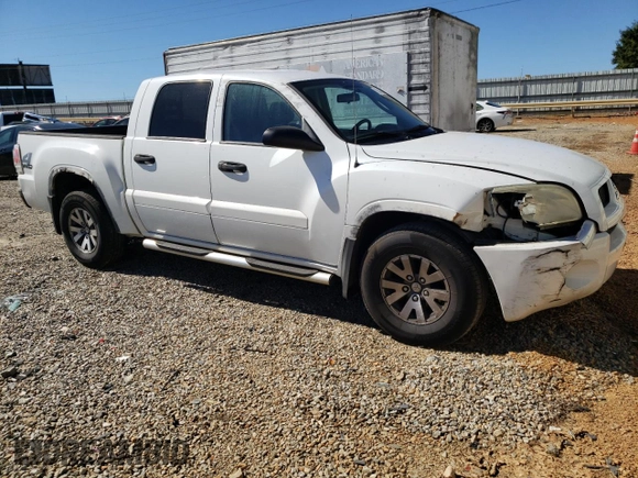 2007 Mitsubishi Raider LS z VIN 1Z7HT28K57S234309, wystawiony jako Copart lot #75505104 z przebiegiem 210 964 mil mil oraz Szkoda całkowita • Salvage title. Historia ofert i sprzedaży dostępna na DreamBid. Obrazek 4.