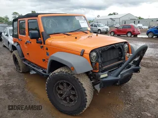 2013 Jeep Wrangler Unlimited Sport z VIN 1C4BJWDG8DL513534, wystawiony jako IAAI lot #42284725 z przebiegiem 92 991 mil mil oraz . Historia ofert i sprzedaży dostępna na DreamBid. Obrazek 1.