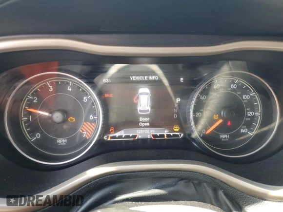 2015 Jeep Cherokee Limited with VIN 1C4PJLDBXFW765909, listed as a Copart auction lot 52293525 with 125,702 mi miles and Salvage Title. Bid and sale history available at DreamBid. Image 9.