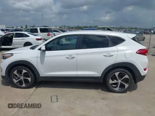 2016 Hyundai Tucson Limited with VIN KM8J33A21GU079870, listed as a IAAI auction lot 42074089 with 78,328 mi miles. Bid and sale history available at carsss.com. Image 14.
