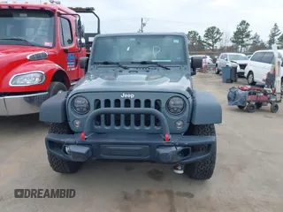 2015 Jeep Wrangler Unlimited Rubicon Hard Rock z VIN 1C4HJWFG1FL679873, wystawiony jako IAAI lot #41508722 z przebiegiem 97 165 mil mil oraz . Historia ofert i sprzedaży dostępna na DreamBid. Obrazek 12.