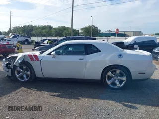 2014 Dodge Challenger R/T with VIN 2C3CDYBT6EH185590, listed as a IAAI auction lot 42536813 with 198,854 mi miles and . Bid and sale history available at DreamBid. Image 14.