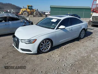 2015 Audi A6 Premium Plus z VIN WAUGFAFC4FN016103, wystawiony jako IAAI lot #41774479 z przebiegiem 125 412 mil mil oraz . Historia ofert i sprzedaży dostępna na DreamBid. Obrazek 18.