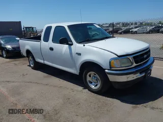 1997 Ford F-150 with VIN 1FTDX1724VKD74696, listed as a IAAI auction lot 42720977 with 102,130 mi miles and . Bid and sale history available at DreamBid. Image 1.