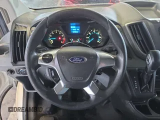 2016 Ford Transit Cargo z VIN 1FTYE1YM9GKB18600, wystawiony jako IAAI lot #42726792 z przebiegiem 127 434 mil mil oraz . Historia ofert i sprzedaży dostępna na DreamBid. Obrazek 26.