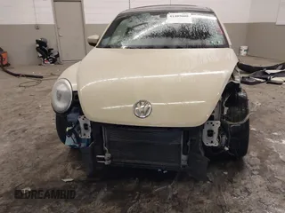 2019 Volkswagen Beetle S with VIN 3VWFD7ATXKM705322, listed as a IAAI auction lot 41409600 with 97,479 mi miles. Bid and sale history available at carsss.com. Image 6.