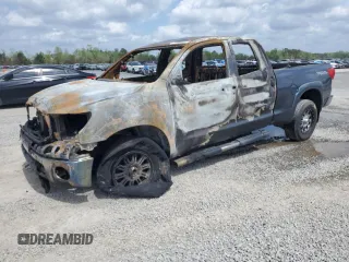 2010 Toyota Tundra z VIN 5TFUM5F15AX005061, wystawiony jako Copart lot #51823565 z przebiegiem Nie podano mil oraz Szkoda całkowita • Salvage title. Historia ofert i sprzedaży dostępna na DreamBid. Obrazek 1.