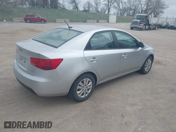 2012 Kia Forte EX with VIN KNAFU4A25C5591601, listed as a IAAI auction lot 42071351 with 120,636 mi miles. Bid and sale history available at carsss.com. Image 4.