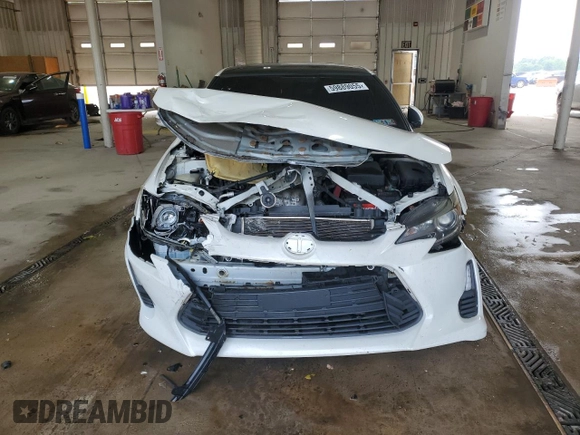 2016 Scion tC z VIN JTKJF5C73GJ024430, wystawiony jako Copart lot #59889055 z przebiegiem 142 532 mil mil oraz Szkoda całkowita • Salvage title. Historia ofert i sprzedaży dostępna na DreamBid. Obrazek 5.