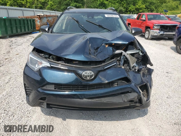 2018 Toyota RAV4 LE with VIN JTMBFREV7JJ253067, listed as a Copart auction lot 60596735 with Not provided miles and Salvage title. Bid and sale history available at DreamBid. Image 5.