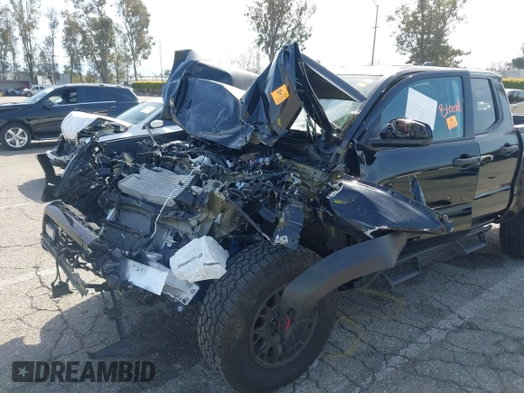2025 Toyota Tacoma SR with VIN 3TMLB5JN2SM090007, listed as a IAAI auction lot 41830185 with 4,359 mi miles and . Bid and sale history available at DreamBid. Image 6.