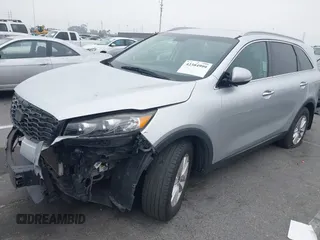 2019 Kia Sorento LX z VIN 5XYPG4A36KG438741, wystawiony jako IAAI lot #42384999 z przebiegiem 94 640 mil mil oraz . Historia ofert i sprzedaży dostępna na DreamBid. Obrazek 18.