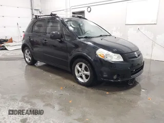 2009 Suzuki SX4 Man AWD with VIN JS2YB413596200885, listed as a IAAI auction lot 41189776 with 111,891 mi miles. Bid and sale history available at carsss.com. Image 1.