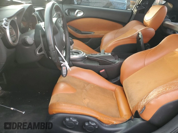 2011 Nissan 370Z Touring with VIN JN1AZ4EH6BM550267, listed as a Copart auction lot 82245804 with 124,466 mi miles and Salvage Title. Bid and sale history available at carsss.com. Image 7.