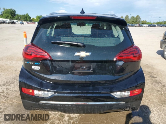 2021 Chevrolet Bolt EV Premier with VIN 1G1FZ6S04M4109942, listed as a Copart auction lot 60393574 with 46,871 mi miles and Salvage title. Bid and sale history available at DreamBid. Image 6.