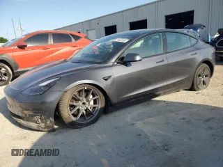 2021 Tesla Model 3 Standard Range Plus with VIN 5YJ3E1EA5MF090808, listed as a Copart auction lot 51663135 with 52,189 mi miles and Clean Title. Bid and sale history available at DreamBid. Image 1.