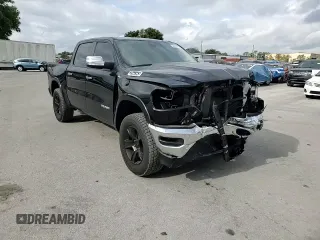 2022 Ram 1500 Laramie with VIN 1C6SRFJT4NN300006, listed as a Copart auction lot 54976775 with 61,436 mi miles and Salvage title. Bid and sale history available at DreamBid. Image 14.