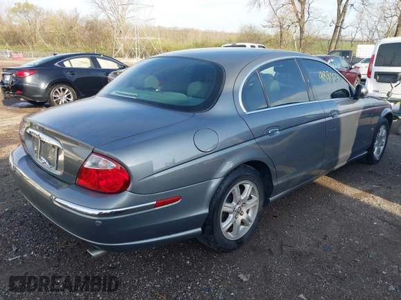 2003 Jaguar S-Type with VIN SAJEA01T23FM93839, listed as a IAAI auction lot 41891973 with 153,761 mi miles and . Bid and sale history available at DreamBid. Image 4.