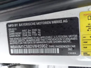 2013 BMW X1 28i with VIN WBAVM1C58DVW45962, listed as a IAAI auction lot 41323144 with 117,363 mi miles. Bid and sale history available at carsss.com. Image 9.