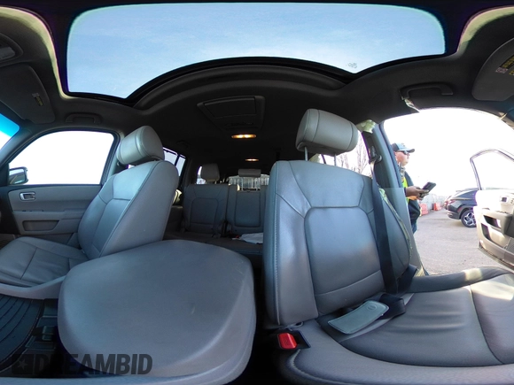 2012 Honda Pilot Touring with VIN 5FNYF4H93CB077057, listed as a IAAI auction lot 41156160 with 139,834 mi miles and . Bid and sale history available at DreamBid. Image 18.